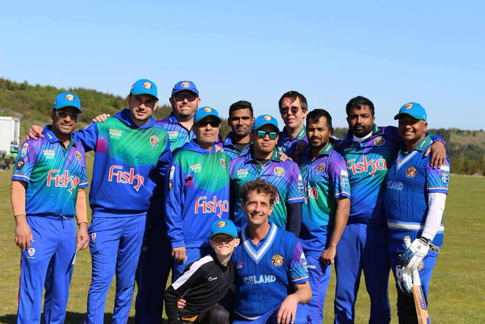 Kópavogur Puffins cricket team in Iceland wearing shirts featuring Indian Food Box sponsorship